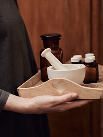 Wooden tray in hands LR
