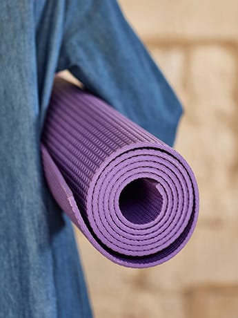 Yoga mat under arm